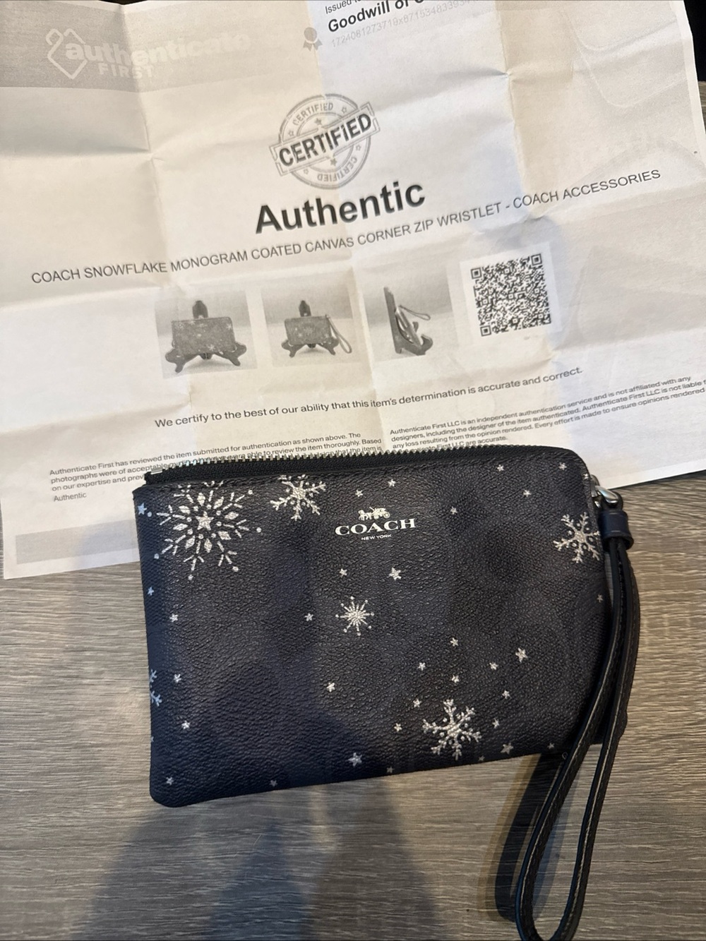 Coach snowflake star wristlet clutch wallet
